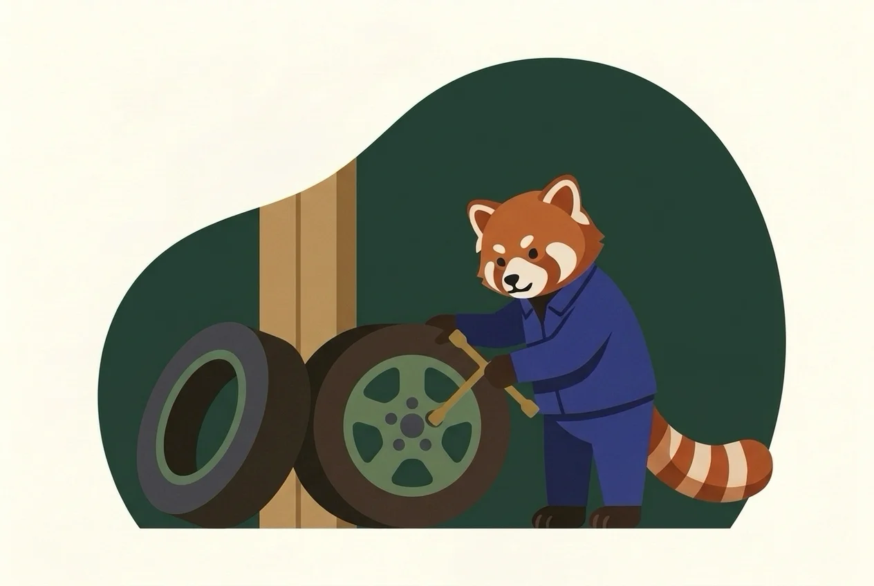 A technician repairing a punctured tyre